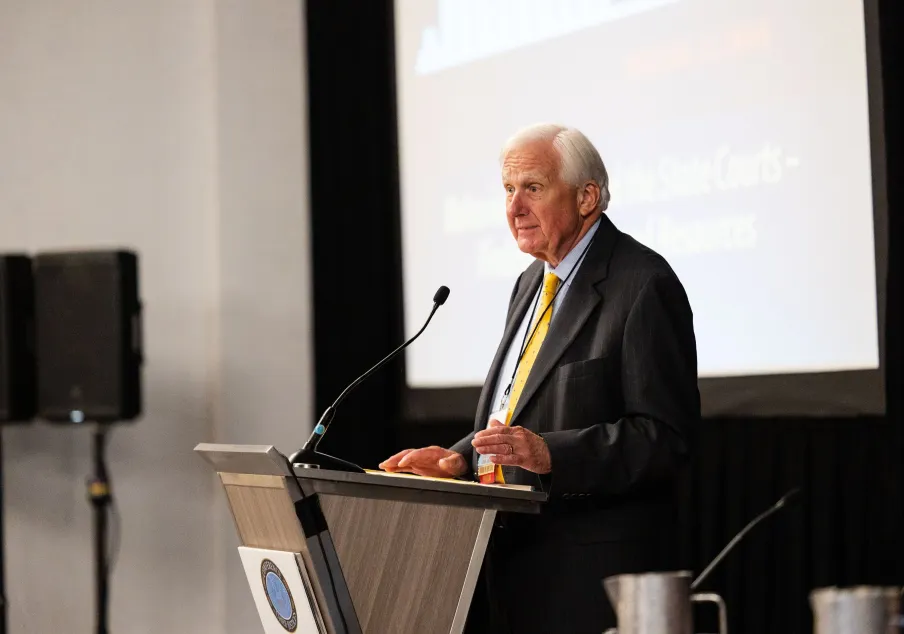 Paul Suttell, Rhode Island Chief Justice, speaking at at conference